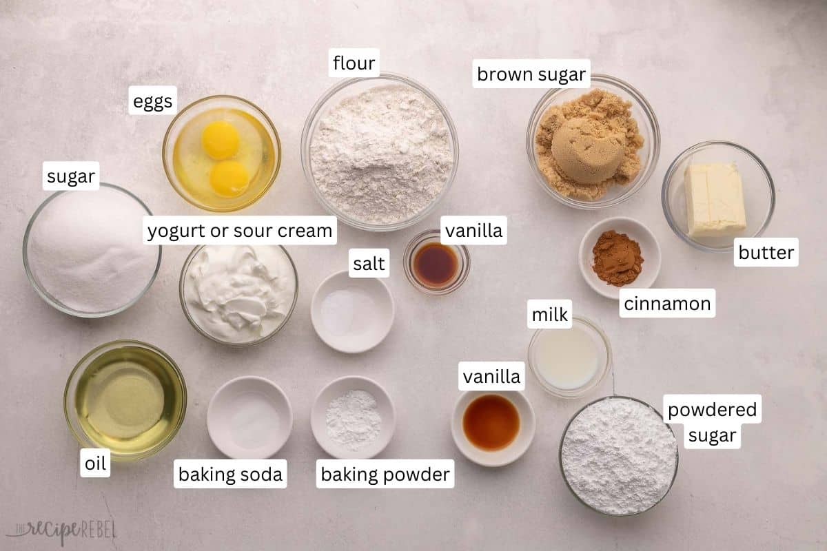 ingredients needed for cinnamon roll cake in bowls.