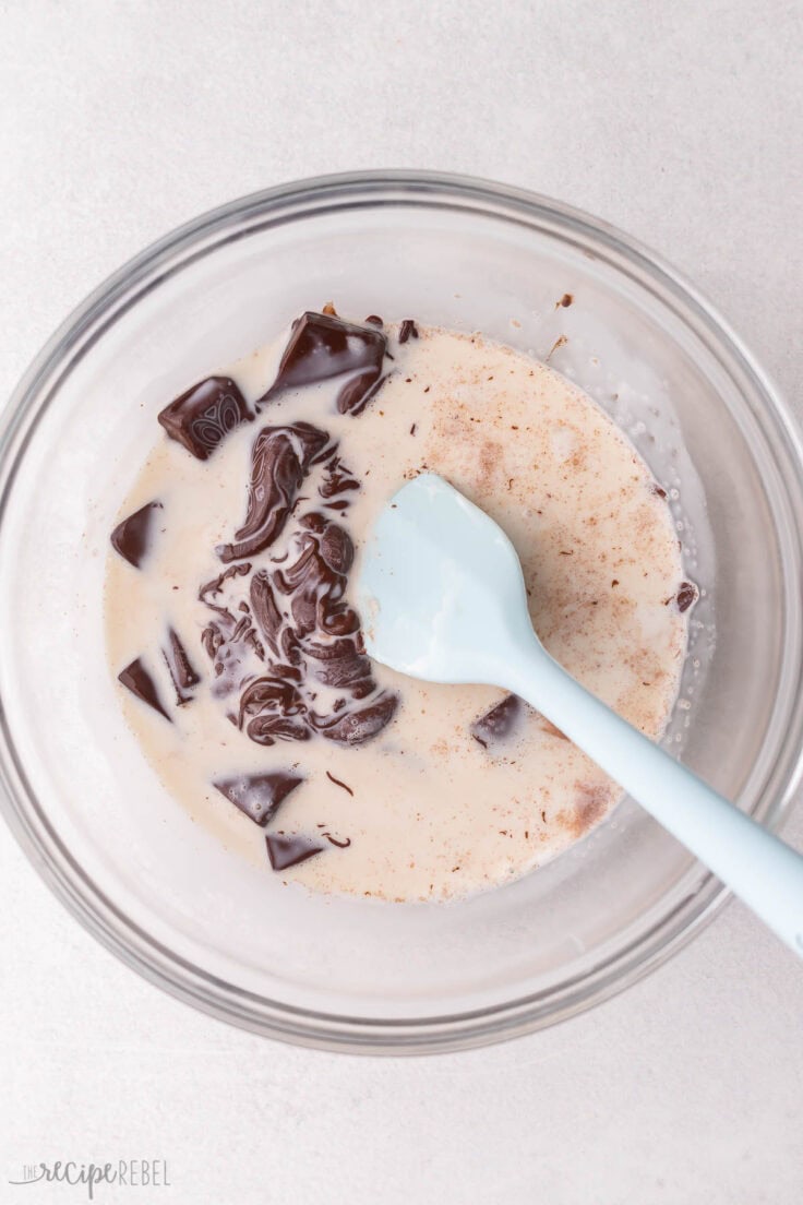 unmixed chocolate and cream in glass mixing bowl.