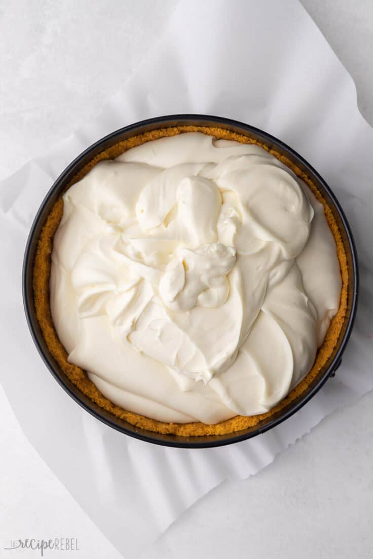 cream cheese mixture added to crust in spring form pan.