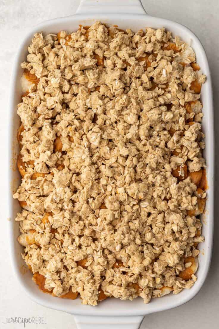 white dish full of pumpkin french toast casserole ready to go in the oven.