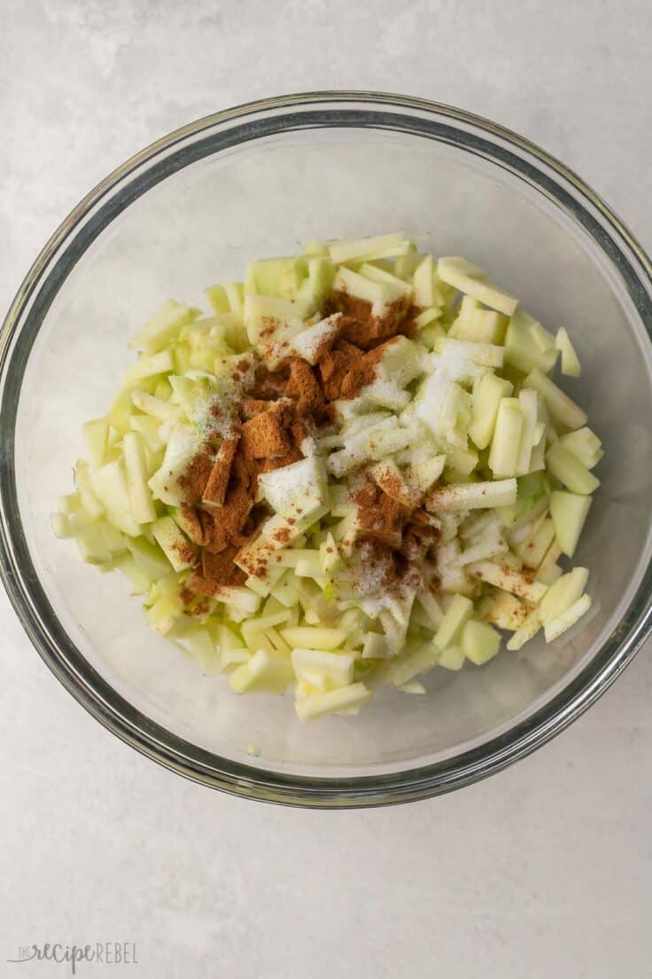 cinnamon and sugar added to chopped apples.