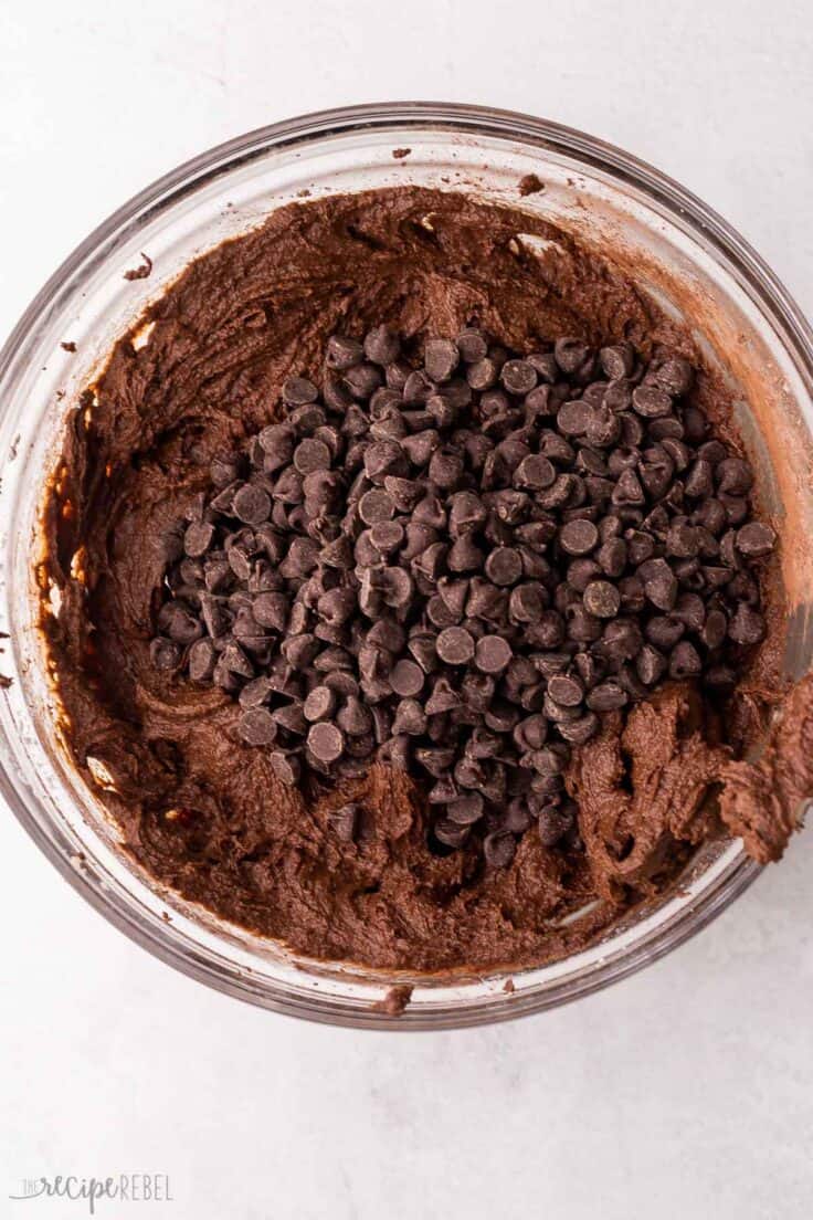 chocolate chips added to bowl of cookie dough.