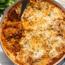 square image of skillet lasagna in a cast iron braiser.