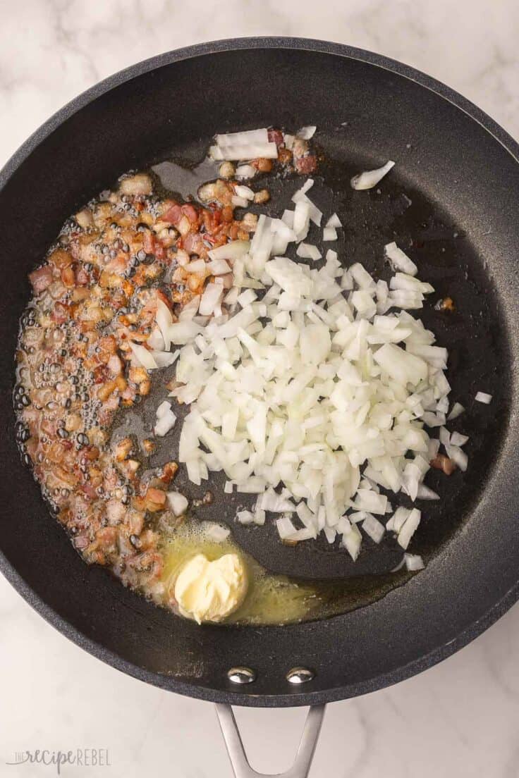 chopped bacon, onions and butter in black pan.