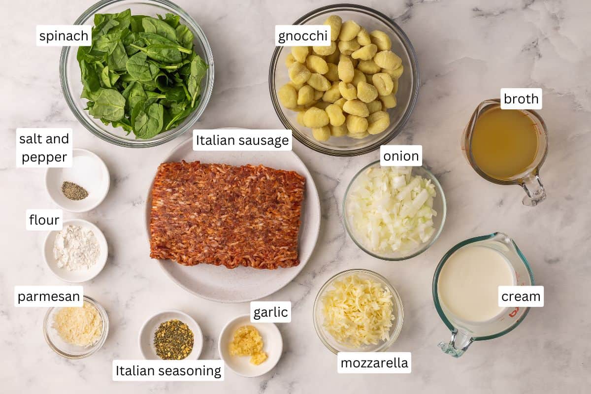ingredients needed for baked gnocchi with sausage in bowls and plate.