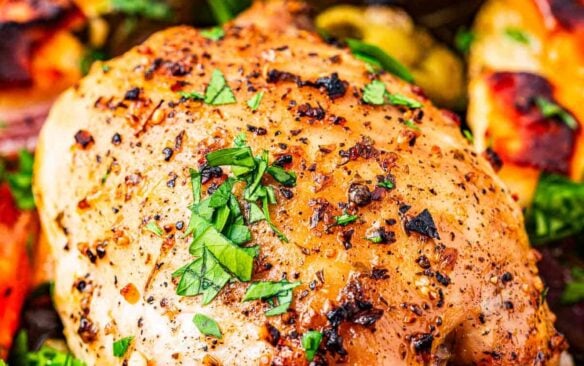 close up of Greek sheet pan chicken thighs