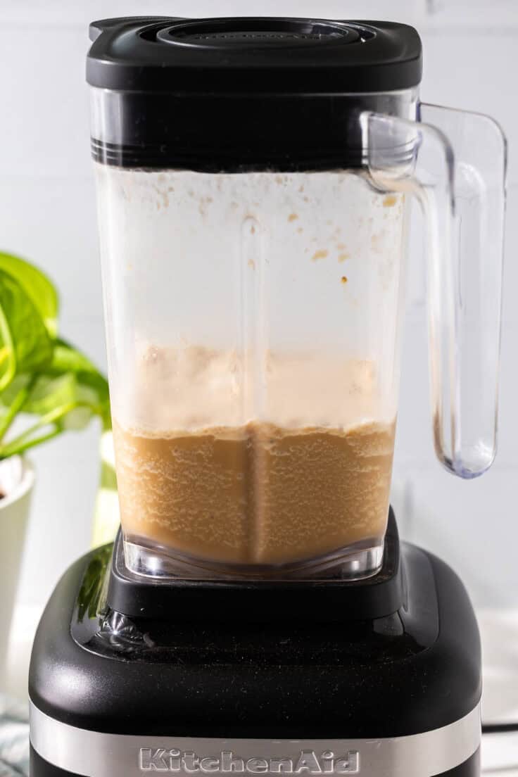 a blender filled with blended frappuccino.