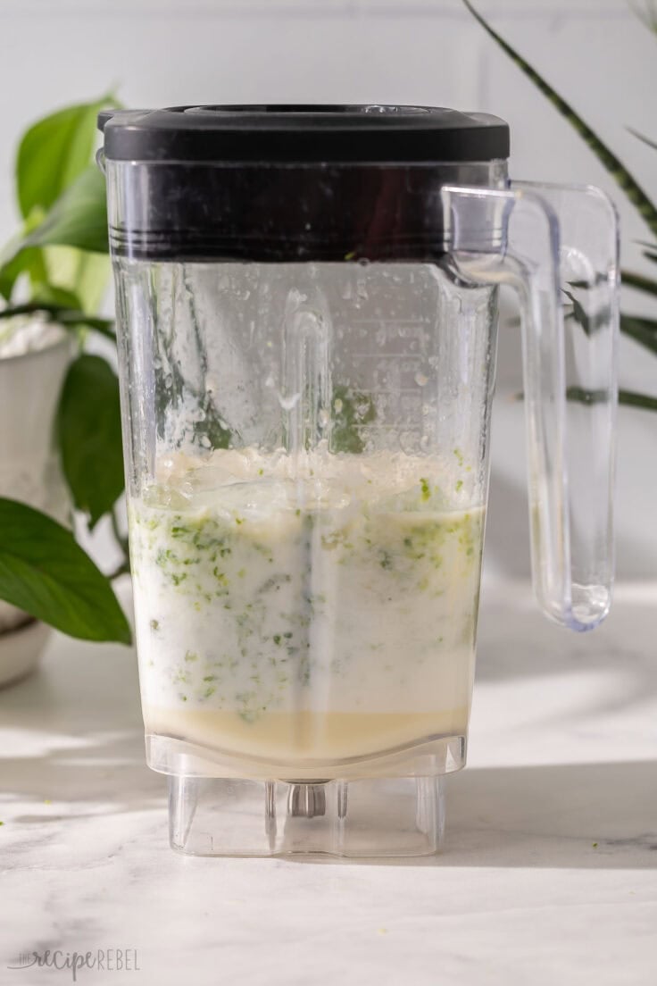 a blender full of frozen limeade ingredients.