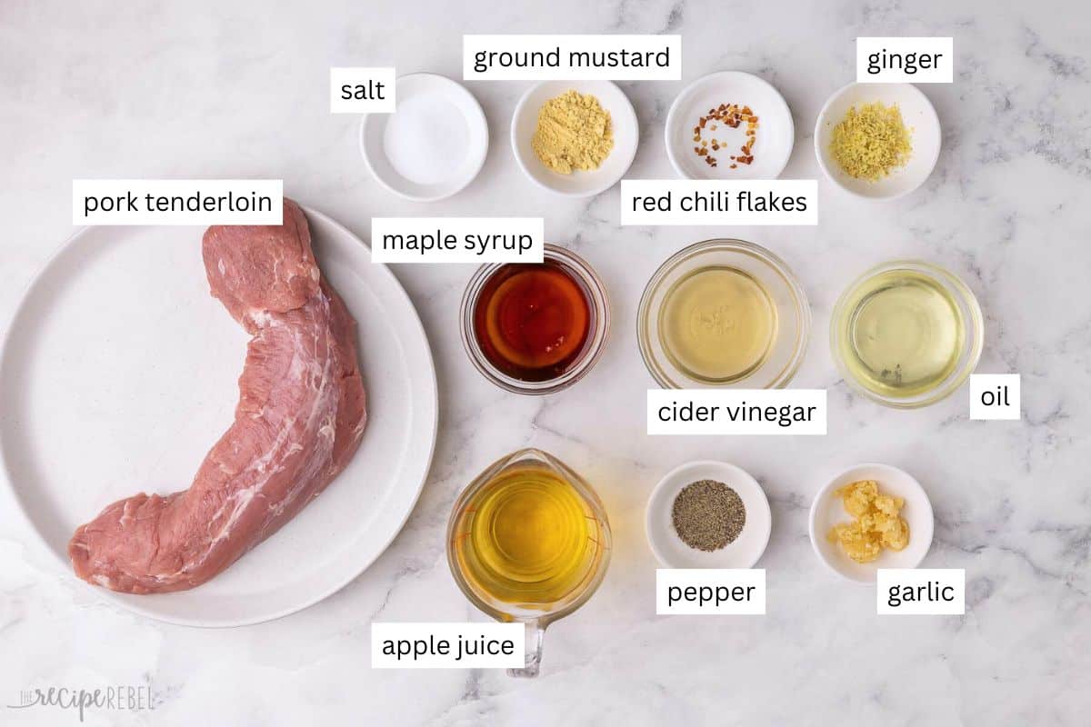 ingredients needed for grilled pork tenderloin in bowls and plate.