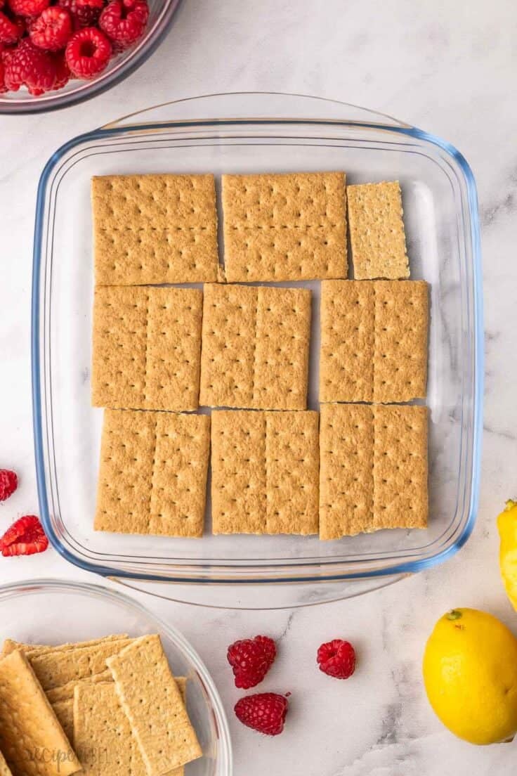 graham cracker layer in a glass dish.