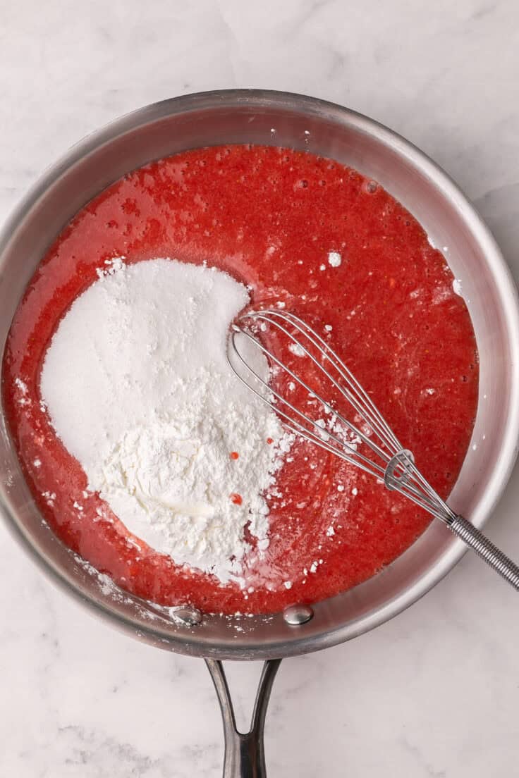 pan filled with stawberry puree and other ingredients added.