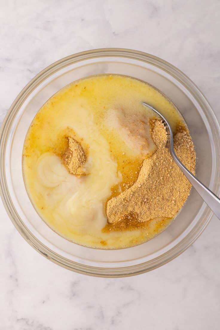 unmixed crust ingredients in glass mixing bowl.