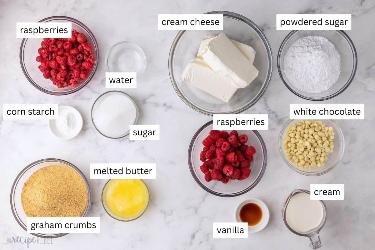 ingredients needed for white chocolate raspberry cheesecake in bowls.