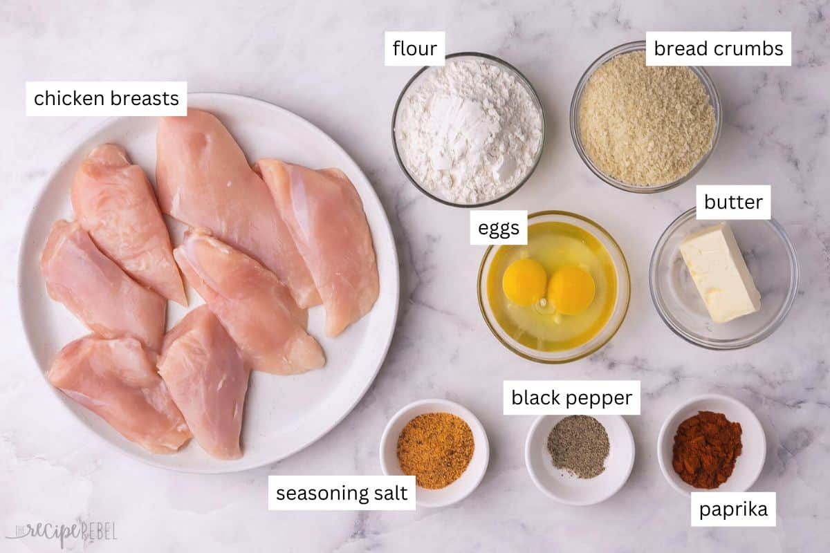 ingredients needed for oven fried chicken in bowls and plate.