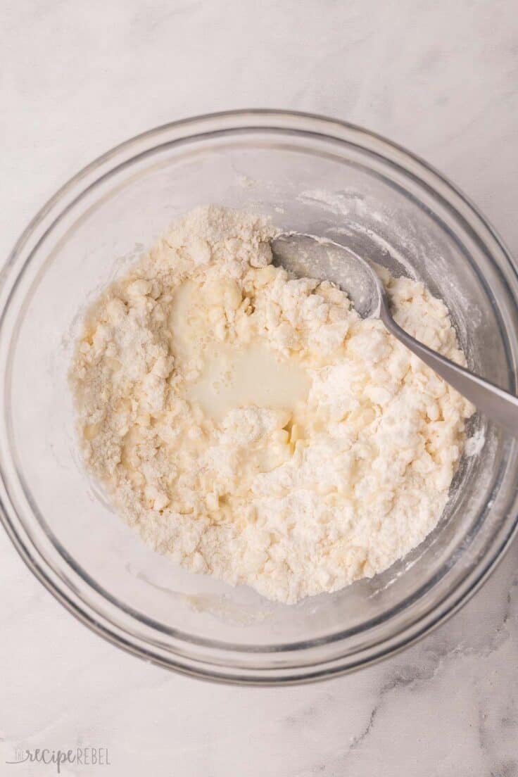 wet ingredients added to bowl of dough mixture.