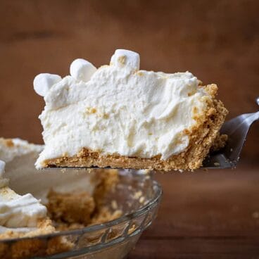 slice of no bake marshmallow cream cheesecake.