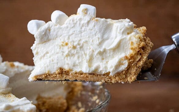 slice of no bake marshmallow cream cheesecake.