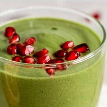 pomegranate green smoothie in a glass.