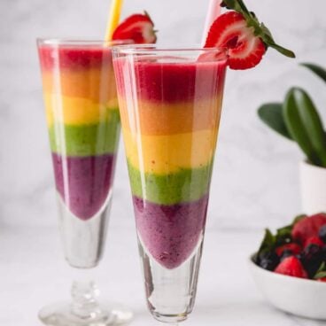 rainbow smoothie in a tall glass.