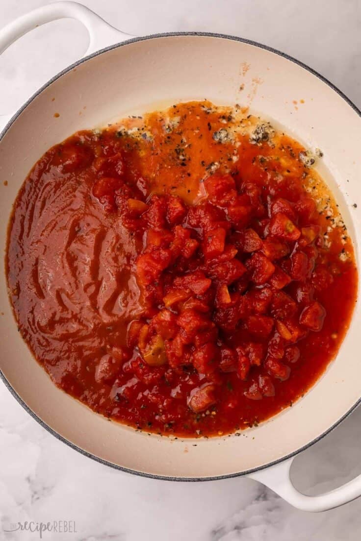 tomato sauce added to skillet with other ingredients.