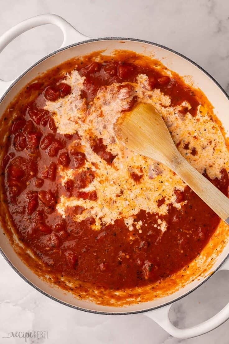 cream added to sauce ingredients in skillet.