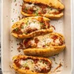 baked meatball subs in pan.
