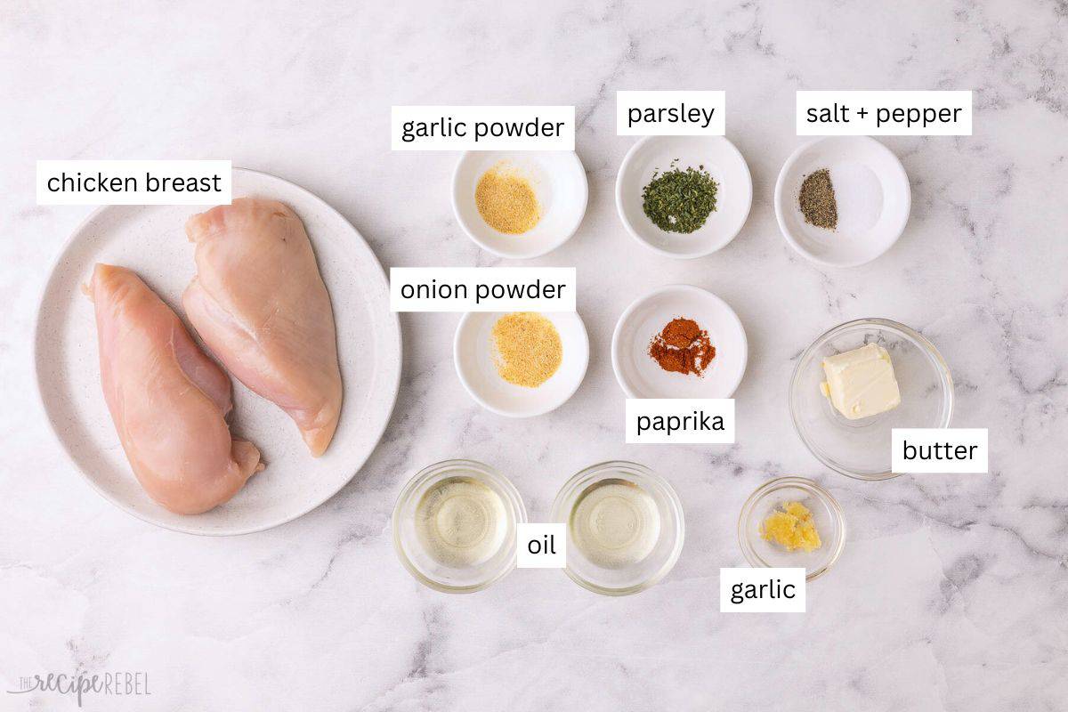 ingredients needed for pan fried chicken breasts in bowls and plate.