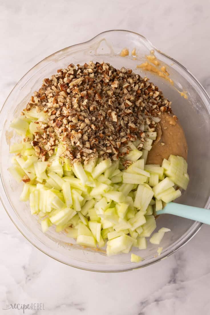 chopped pecans and apples added to mixing bowl.