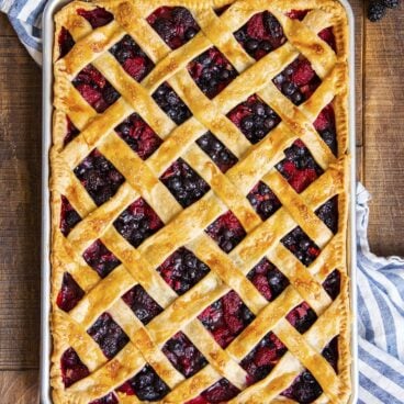 berry rhubarb slab pie in a baking dish.