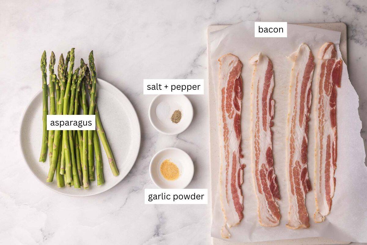 Bacon Wrapped Asparagus is an elegant yet easy side dish or appetizer made with slices of thin-cut bacon wrapped around asparagus stalks, sprinkled with seasonings, and baked until crispy. #appetizer #recipe | appetizer recipes | side dishes | vegetables | roast vegetables ingredients needed for bacon wrapped asparagus in bowls and plate.