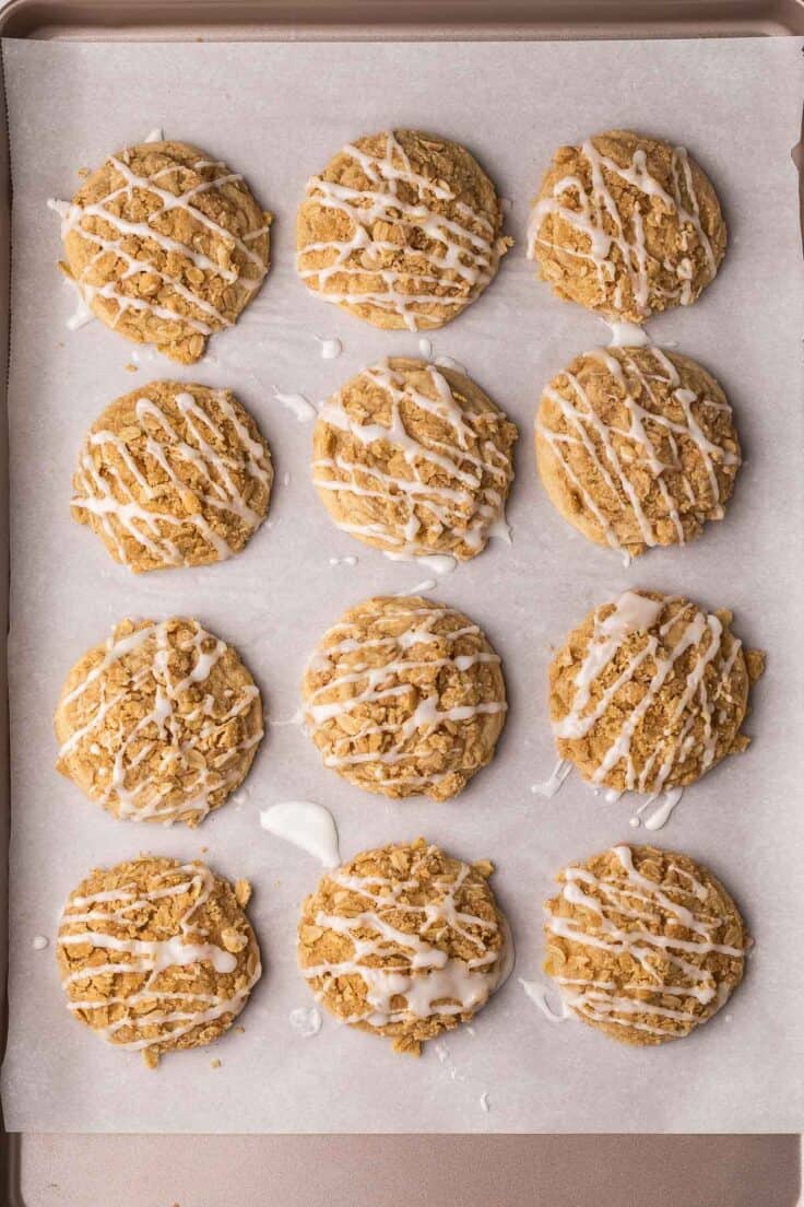 large pan of coffee cake cookies with glaze on them.