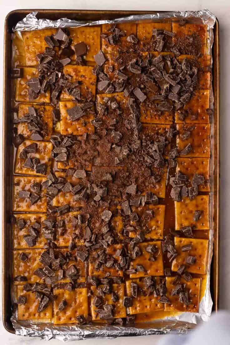 chocolate chunks sprinkled on top of baked toffee crackers.