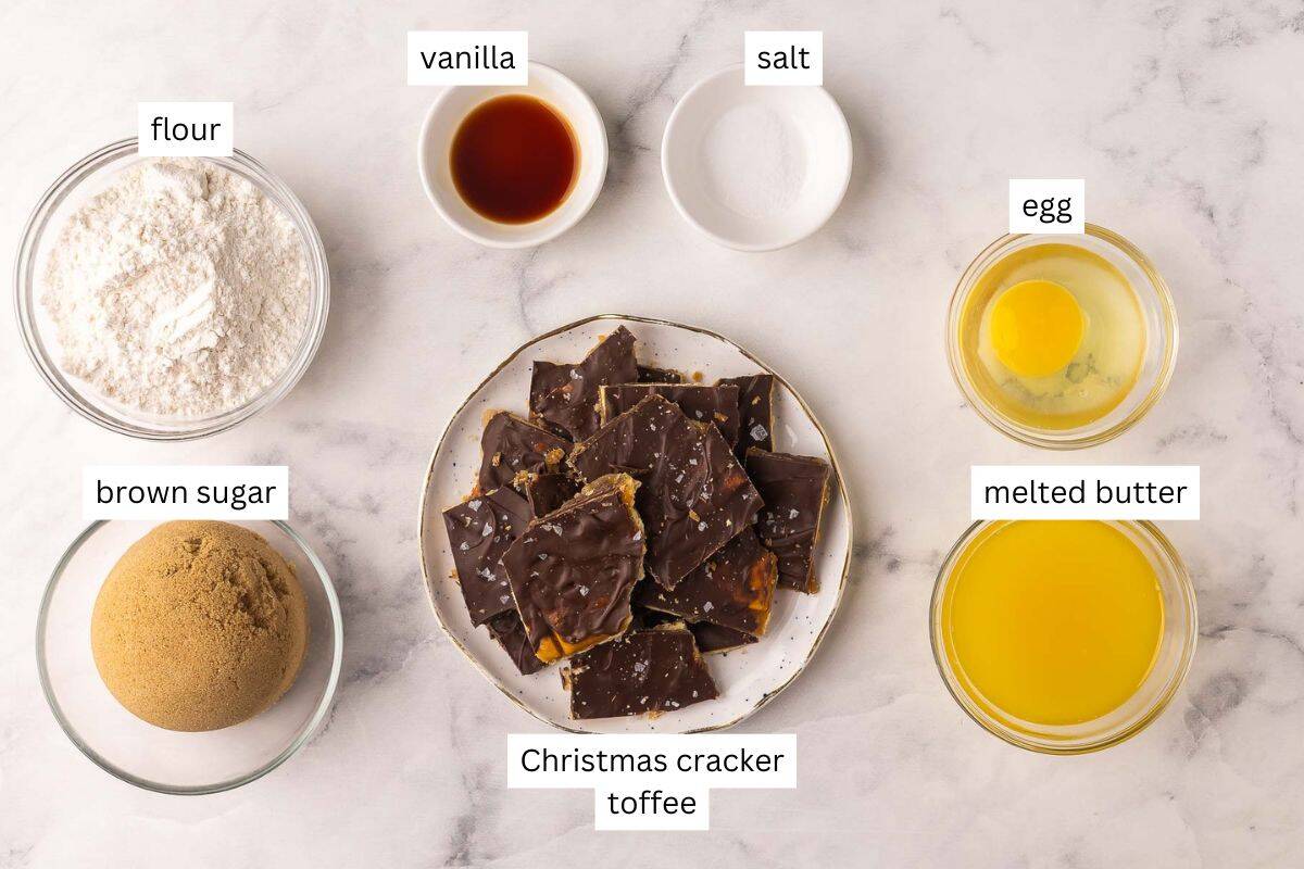 These Christmas Crack Blondies are chewy, buttery bars packed with caramel-chocolate cracker toffee. Made in just 45 minutes, they’re the perfect mash-up of two classic desserts! #dessert #recipe | dessert recipes | christmas recipes | christmas desserts | chocolate | caramel ingredients needed for christmas crack blondies in bowls.