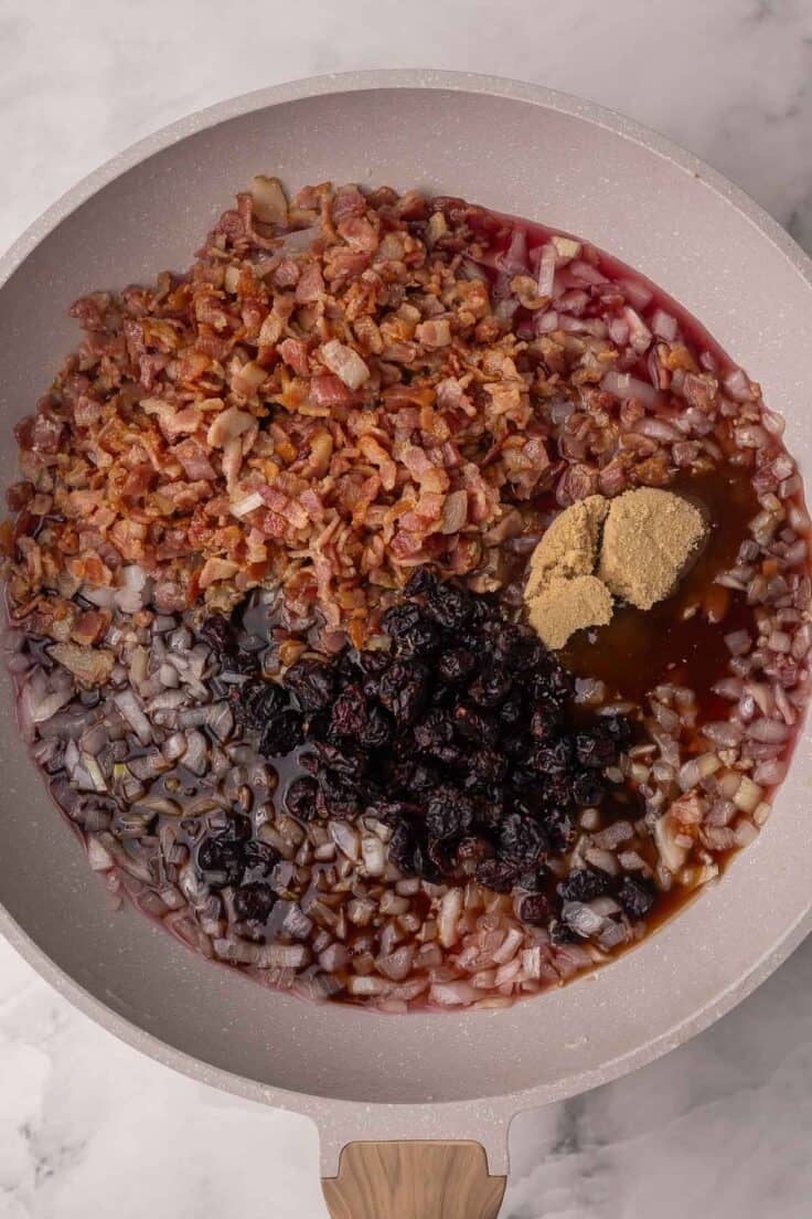 bacon and other ingredients in frying pan.