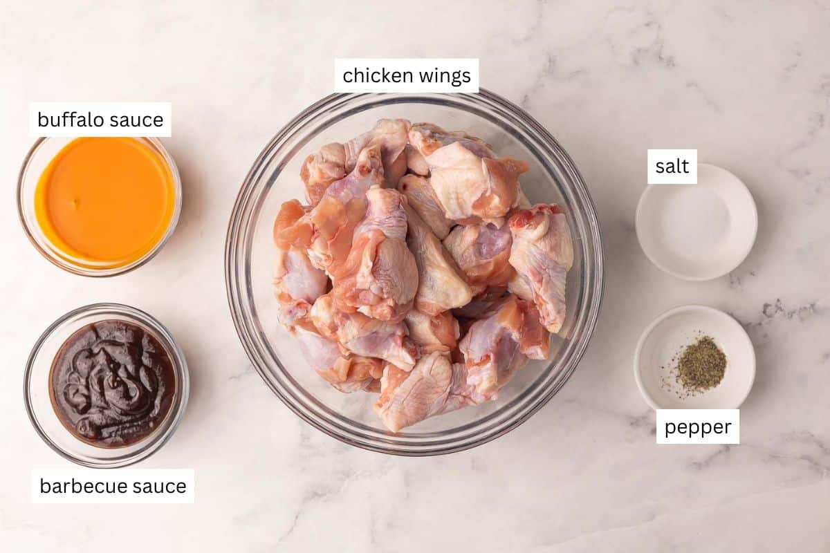 ingredients needed for crockpot chicken wings in bowls.