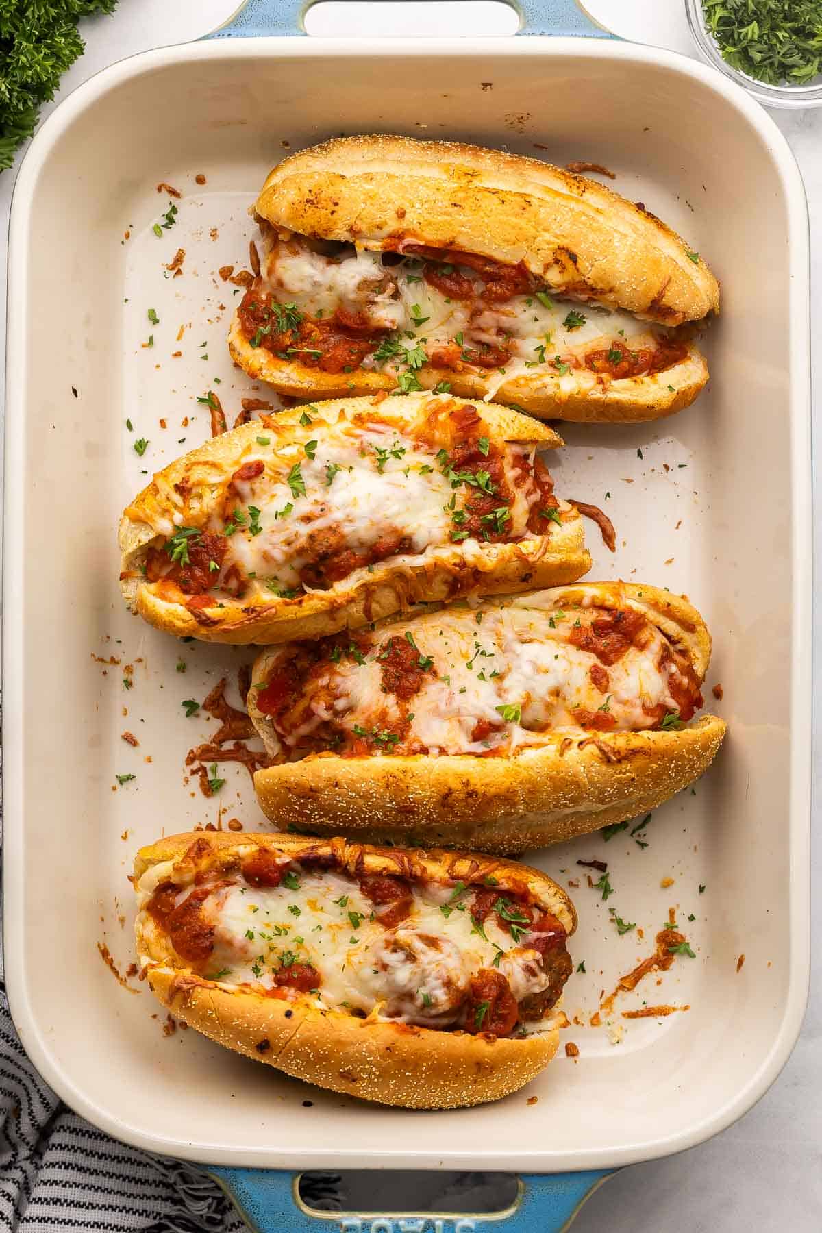overhead image of meatball sub recipe in baking dish.