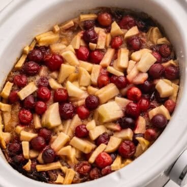 close up of cranberry apple cobbler in crockpot.