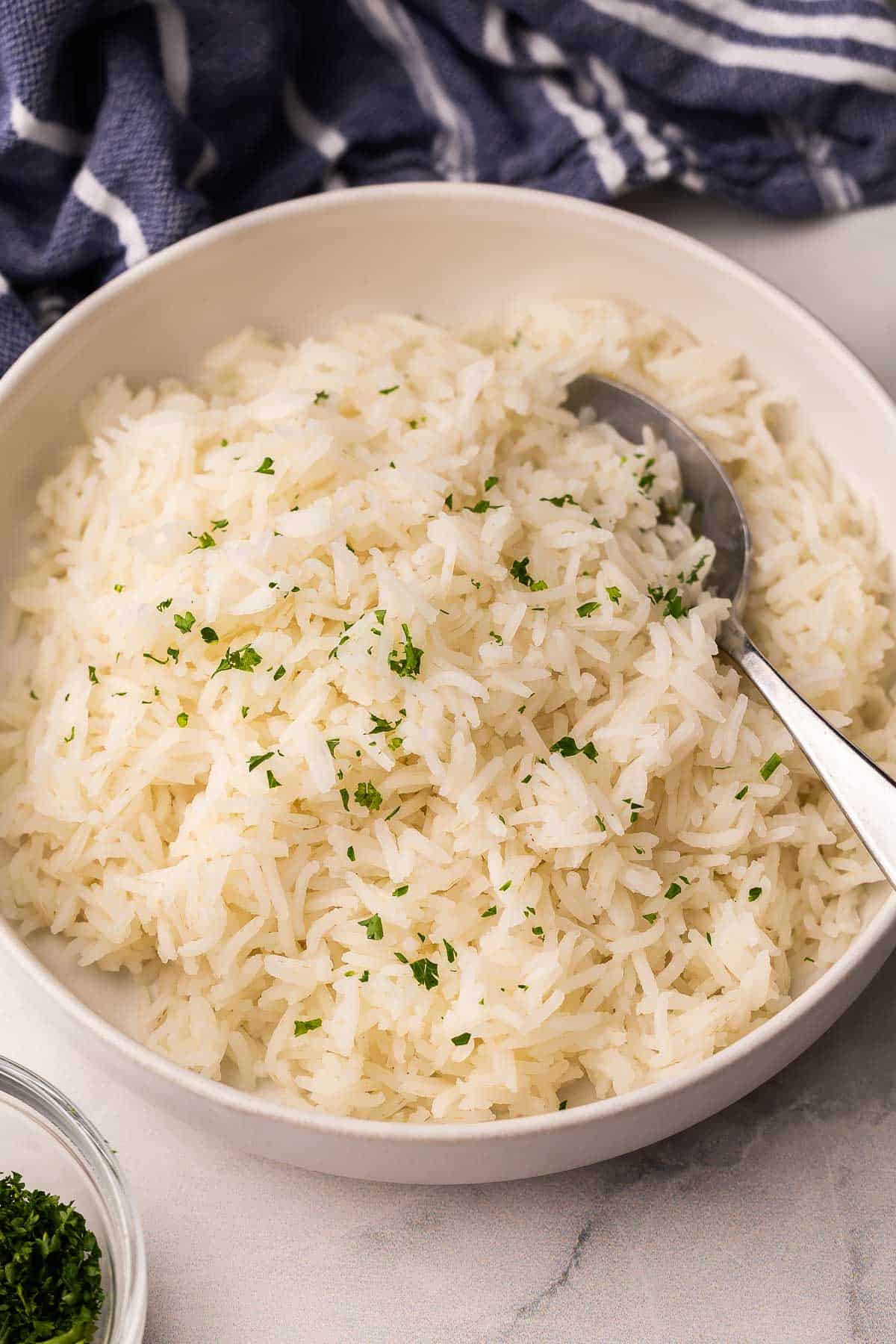 This Perfect Basmati Rice recipe is light, fluffy and never sticky! It takes just 20 minutes and comes out beautifully every single time. #rice #recipe #dinner | dinner recipes | easy recipes | how to cook rice | how to make rice | how to cook basmati rice | basmati rice recipe