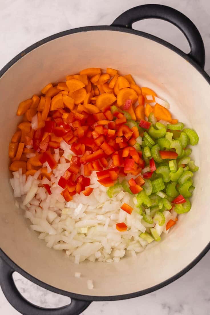 chopped vegetables added to large pot.