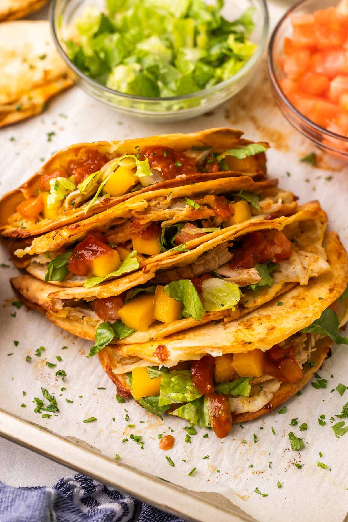 These Crispy Baked Chicken Tacos are made with shredded chicken and cheese, and ready in 35 minutes! Easy to make for a weeknight dinner or fun taco night feast. #taco #recipe #dinner | dinner ideas | dinner recipes | shredded chicken recipes | chicken taco | dinner recipes | chicken breast recipes