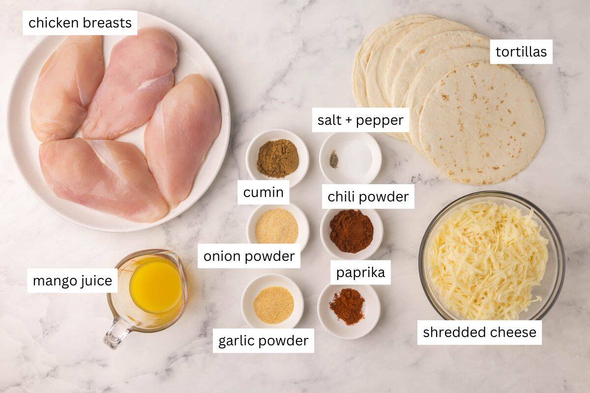 ingredients needed for crispy baked chicken tacos on a white background.