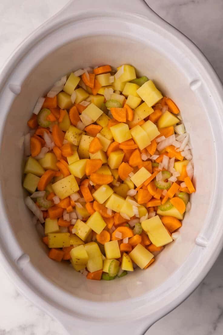 chopped vegetables add to slow cooker.