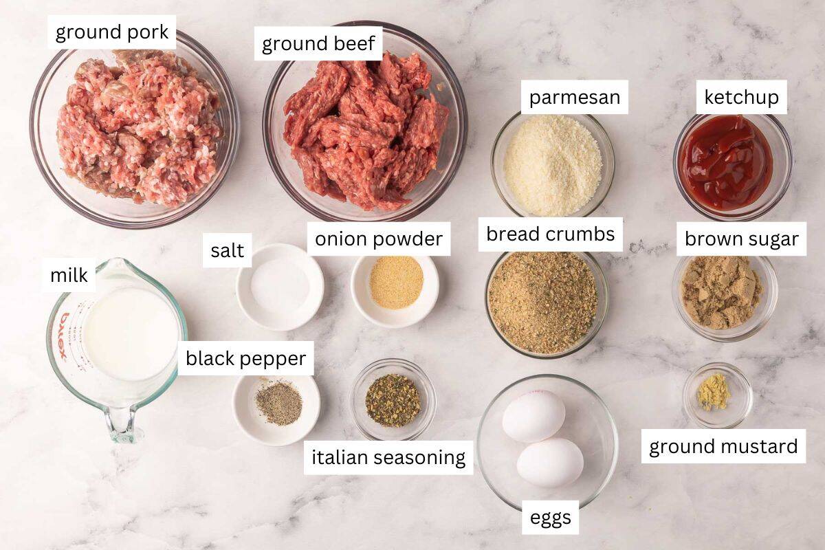 This truly is the BEST Meatloaf Recipe! It's juicy, flavorful, and topped with a sweet ketchup glaze. It's easy, comforting, and also makes a great freezer meal. #groundbeef #dinner #recipe | dinner ideas | dinner recipes | ground beef recipes | ground pork | comfort food | the recipe rebel | make ahead meals | freezer meals ingredients needed for meatloaf in bowls.