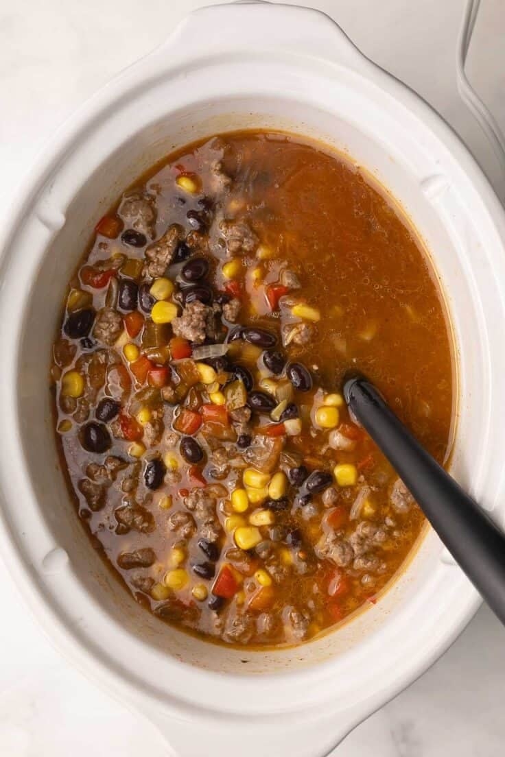 slow cooker taco soup in crockpot ready to cook.