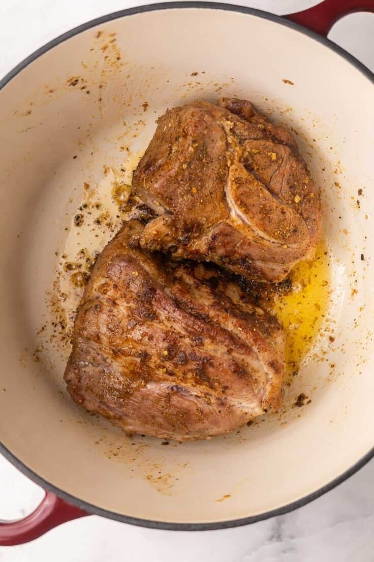 searing pork in a large dutch oven.