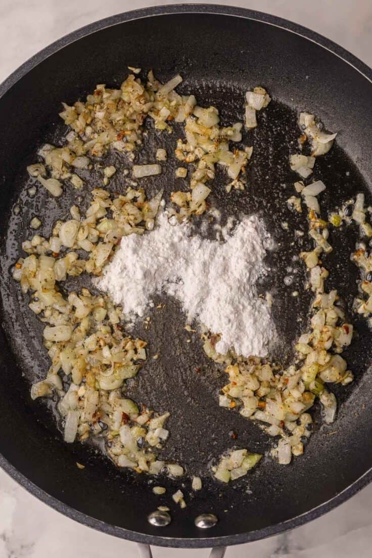 flour added to onion and oil in skillet.