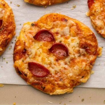 close up of a homemade pizza bun in pan.