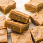 two sliced pumpkin spice latte blondies with more beside.