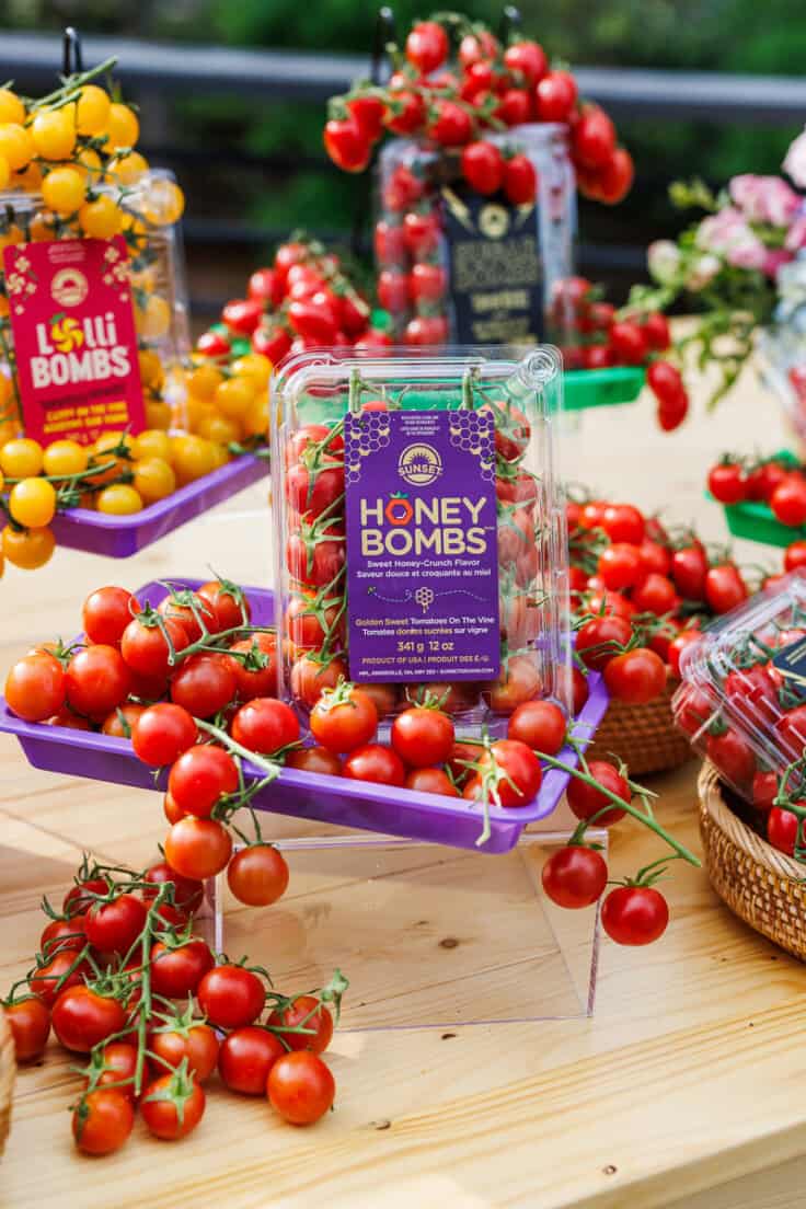 sunset grown honey bombs tomatoes arranged on a table.
