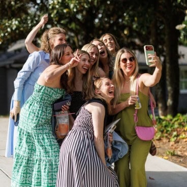 group of women taking a selfie.